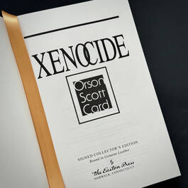 3751 Xenocide Signed Card title page